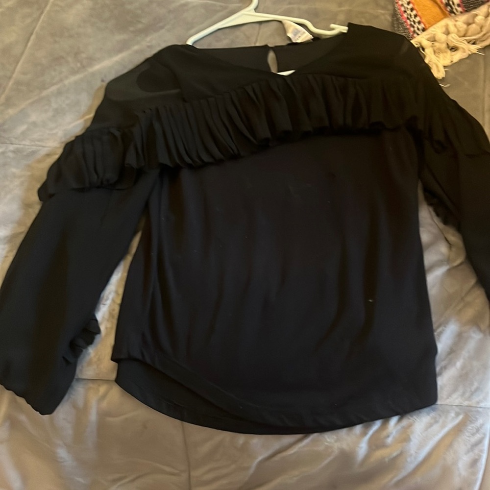 This is a long sleeved sitter at the top, a little bit cute to wear to events